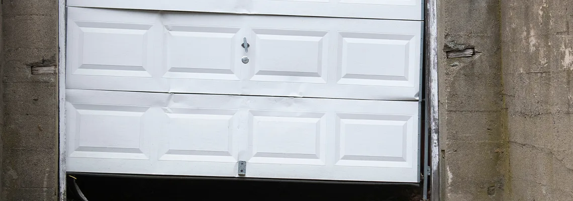 Garage Door Got Hit By A Car Dent Removal in Melbourne, FL