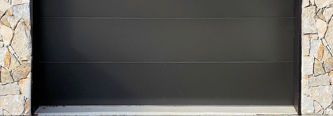 Overhead Black Garage Door Installation in Melbourne, Florida